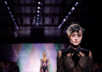 Armani spins harlequin patterns into ballgowns for haute couture lineup in Paris