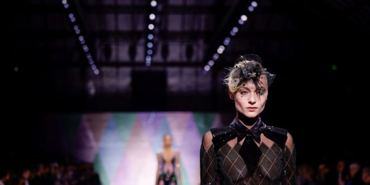 Armani spins harlequin patterns into ballgowns for haute couture lineup in Paris