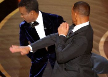 Chris Rock unleashes on Will Smith and wife Jada a year after Oscars slap
