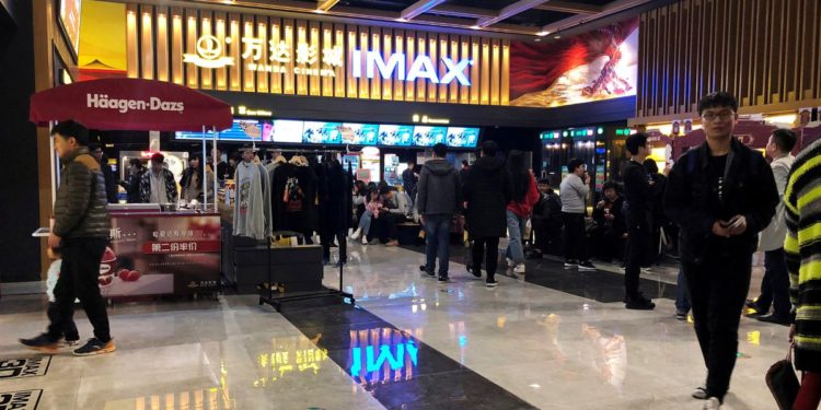 Super-sized screens, rumble seats draw moviegoers back to blockbusters