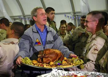 November 27, President George W. Bush spends Thanksgiving with U.S. troops in Iraq