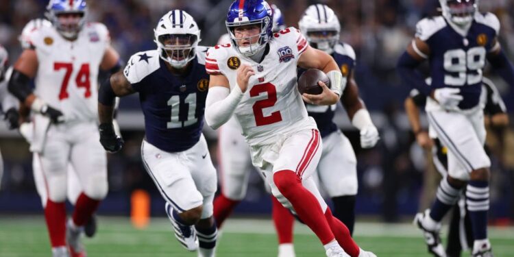 ARLINGTON, TEXAS - NOVEMBER 28: Drew Lock #2 of the New York Giants runs the ball during the first quarter against the Dallas Cowboys at AT&T Stadium on November 28, 2024 in Arlington, Texas. (Photo by Sam Hodde/Getty Images)